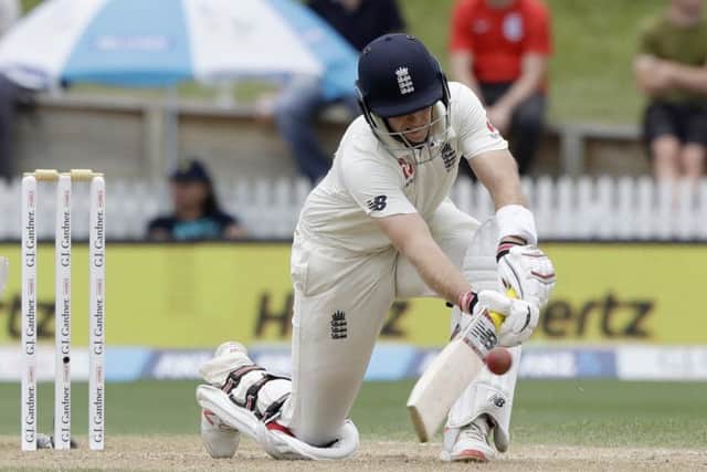England's Joe Root bats during play on day four. (AP Photo/Mark Baker)