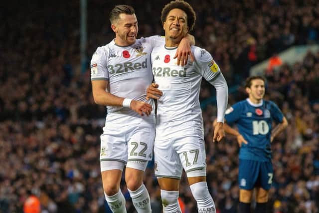 Patience reqarded: Jack Harrison celebrates scoring for Leeds with Helder Costa (Picture: Bruce Rollinson)