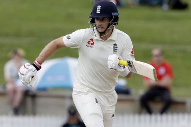England's Joe Root runs a single while batting during play on day four (AP Photo/Mark Baker)