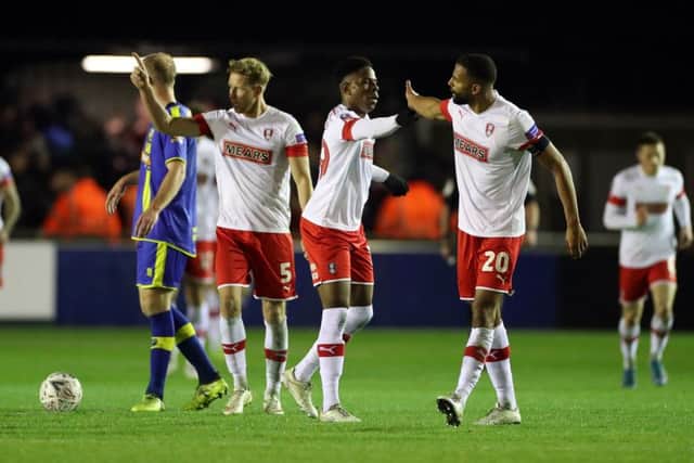 Rotherham United players celebrate their stunning comeback victory over Solihull Moors in the FA Cup second round at Damson Park. Picture: Bradley Collyer/PA