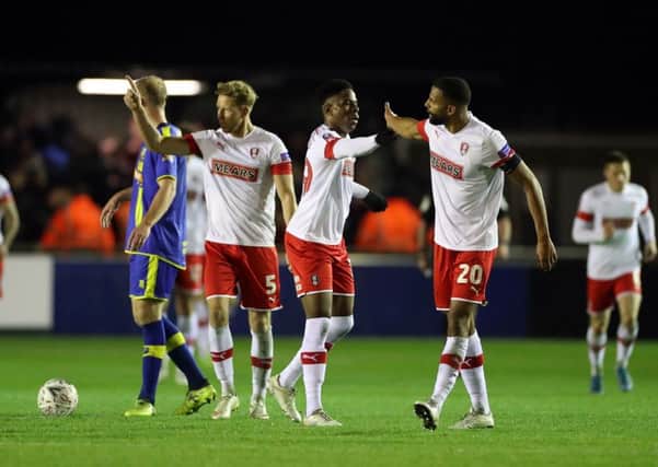 Rotherham United players celebrate their stunning comeback victory over Solihull Moors in the FA Cup second round at Damson Park. Picture: Bradley Collyer/PA