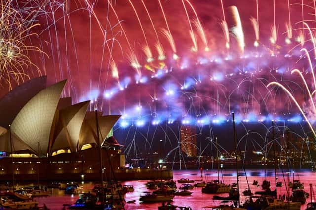 What does the New Year mean to you as fireworks light up the sky above Sydney Harbour?