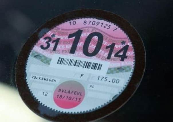 Should the tax disc be reintroduced to help uphold motoring laws?