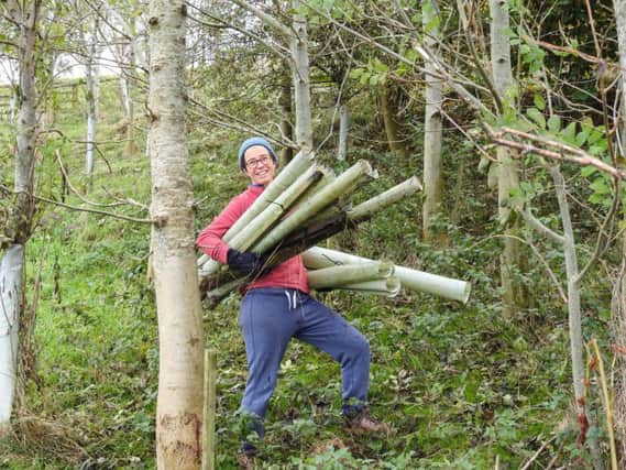 Katie Birks from Plastic Free Skipton with tree guards collected in the litter pick. Picture: Friends of the Dales