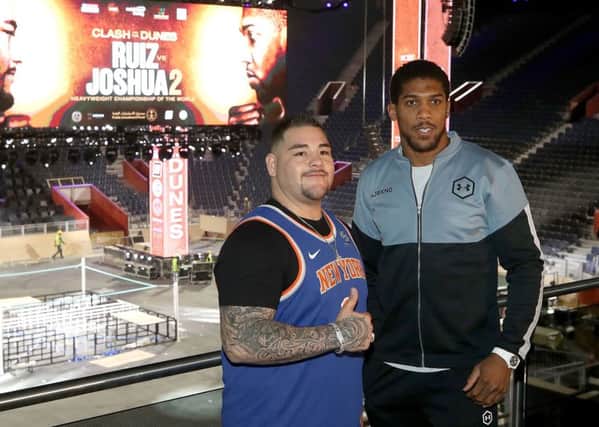 Andy Ruiz Jr (left) and Anthony Joshua as preparations are made to the Diriyah Arena in Riyadh, Saudi Arabia. (Picture: Nick Potts/PA Wire)