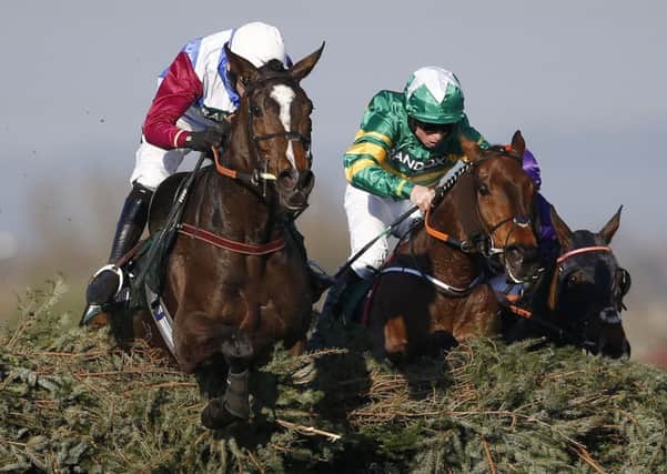 2017 Grand National winner One For Arthur (left) lines up in the Becher Chase this weekend under Derek Fox.