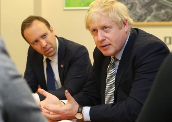 Boris Johnson (right) and Matt Hancock, the Health and Social Care Secretary (left), have repeatedly failed to publish their social care reform plans.