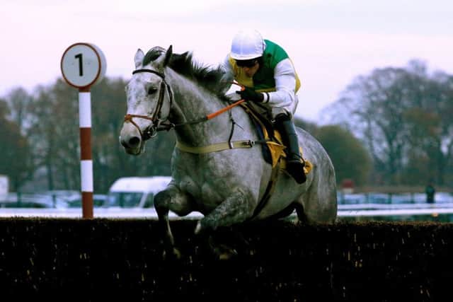 Vintage Clouds and Danny Cook, in winning action at Haydock in November 2018.