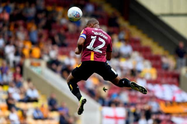 James Vaughan, of Bradford City, heads the ball away. (Picture: James Vaughan)