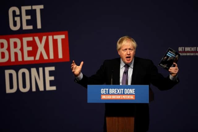 Boris Johnson delivers a speech at the launch of his party's manifesto. Credit: Dan Kitwood/Getty Images