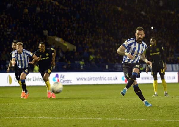 Steven Fletcher converts from the penalty spot for the equalising goal.    Pics: Steve Ellis