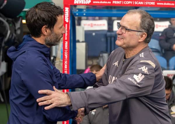 Mutual admiration: Danny Cowley greets Marcelo Bielsa.
 Picture: Bruce Rollinson