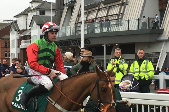Henry Brooke and Definitly Red before their fourth place run in the Becher Chase.