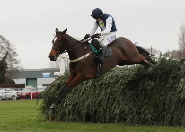 Walk In The Mill clears the last in the Becher Chase under James Best.