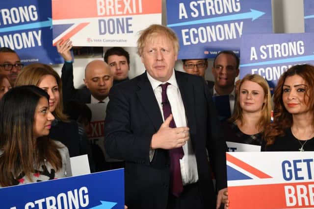 Prime Minister Boris Johnson at Conservative Campaign Headquarters Call Centre, London, while on the election campaign trail.