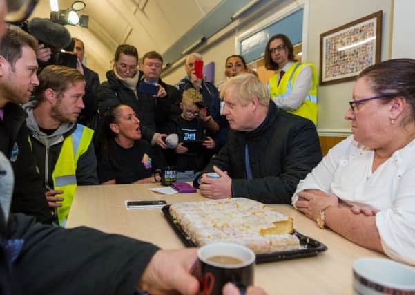 This was Boris Johnson meeting flooding victims in Fishlake on November 13.