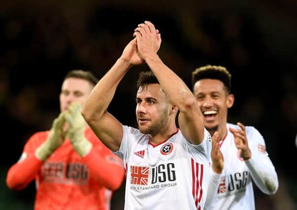 Sheffield United's George Baldock celebrates after the final whistle during the Premier League match at Carrow Road. Picture: Joe Giddens/PA.