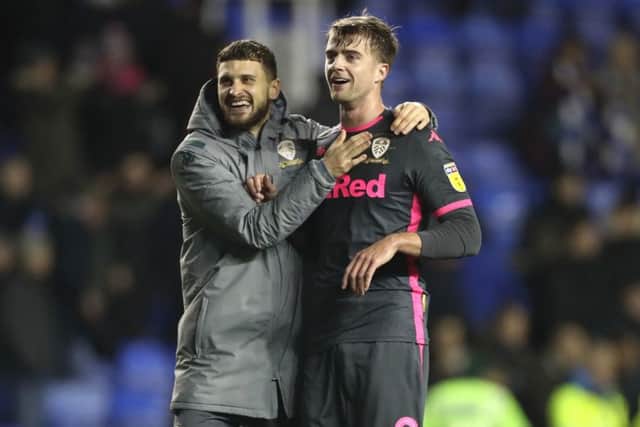 Leeds United's Patrick Bamford, right, celebrates the win over Reading at the Madejski Stadium with Mateusz Klich. Picture: Bradley Collyer/PA