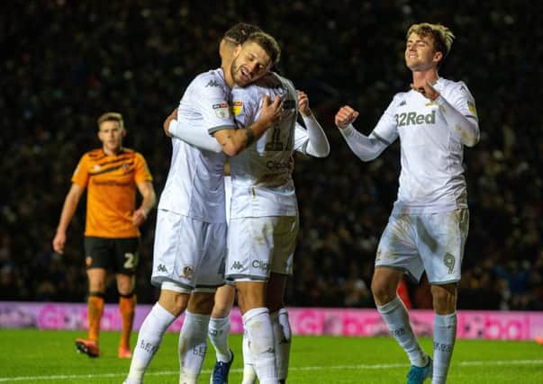 Deadlock broken: Helder Costa celebrates the own goal against Hull City with his Leeds United team-mates Mateusz Klich and Patrick Bamford. (Picture: Bruce Rollinson)