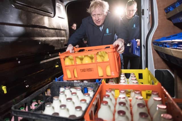 Boris Johnson began the last day of the election campaign delivering milk in Rawdon and Guiseley.