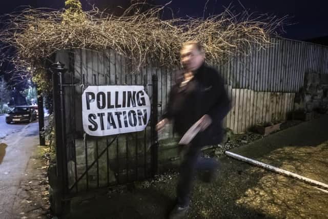 A voter leaves Woodlesford Methodist Chapel polling station in Yorkshire, as polls open in what has been billed as the most important General Election in a generation. Photo: Danny Lawson/PA Wire