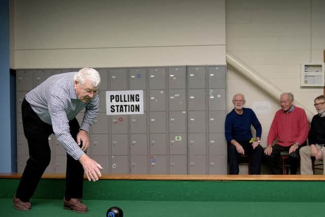 Scarborough Polling Stations open in Scarborough ..Barry Poulter enjoys some bowling as Alexandra Bowls Centre is available also as a polling station for the day. Photo: Richard Ponter