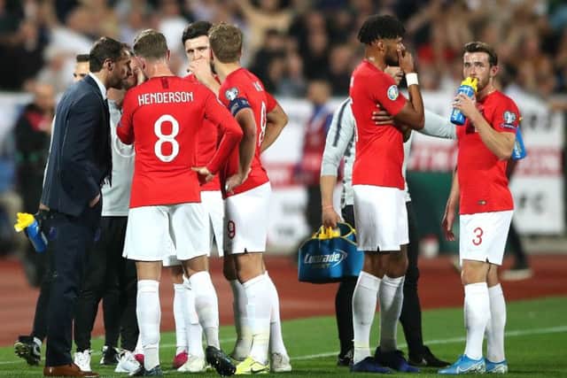 England manager Gareth Southgate (left) speaks to the players with regards to racist chanting from fans during the UEFA Euro 2020 Qualifying match at the Vasil Levski National Stadium, Sofia, Bulgaria. (Picture: Nick Potts/PA Wire)