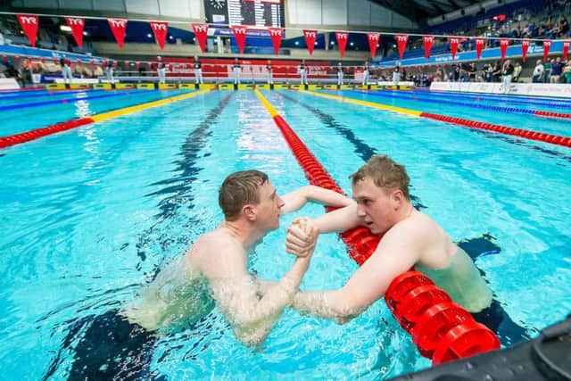 Max Litchfield is congratulated by his brother Joe as he breaks the British record for the 400 IM in Sheffield last year (PIcture: SWPix.com).