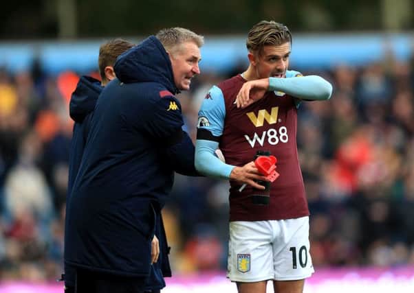 Aston Villa's manager Dean Smith gives instructions to Jack Grealish. Picture: Mike Egerton/PA