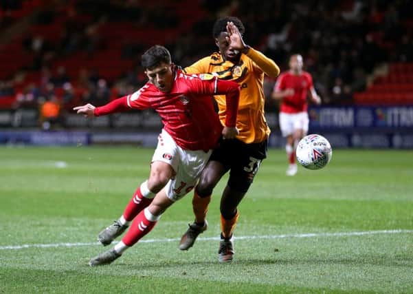 Charlton Athletic's Albie Morgan (left) and Hull City's Leonardo Da Silva Lopes battle for the ball. Picture: Steven Paston/PA
