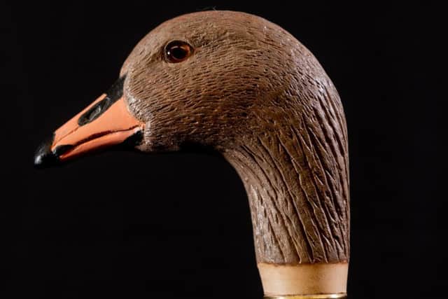 A carved head of a Pinkfooted Goose created by Keith Pickering.