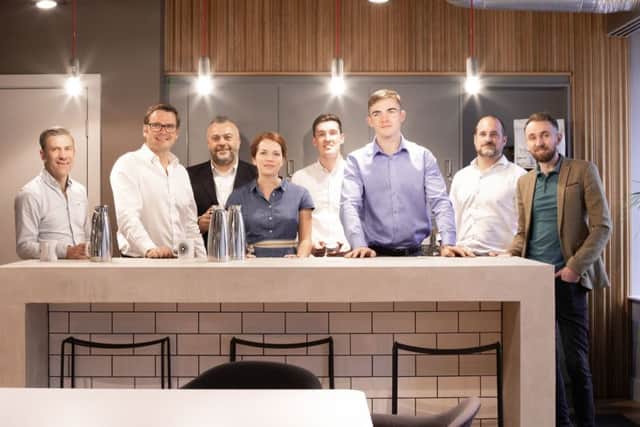 John Readman (second from left) and the team at digital marketing firm Modo25, which has a four-day working week and says it pays London wages in Leeds.