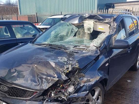 A car smashed into a truck after a driver was "dazzled by bright sunshine". Photo provided by North Yorkshire Police Roads Policing Unit.
