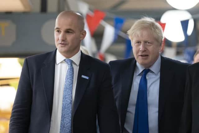 Prime Minister Boris Johnson, walks with Northern Powerhouse minister Jake Berry during a visit to Doncaster Market in September 13. Photo: Jon Super - WPA Pool/Getty Images