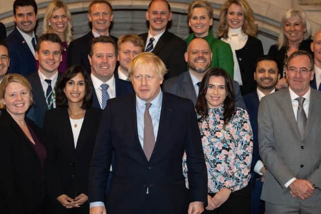 Boris Johnson with some of the new intake of Tory MPs.