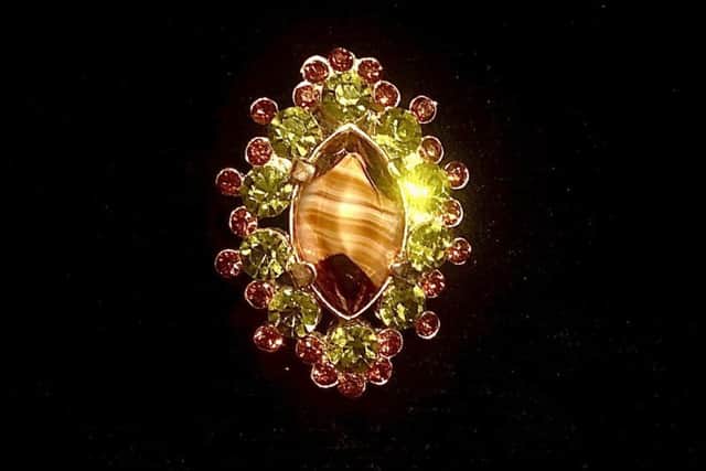 Vintage jewellery offers the chance to buy a one-off quality piece at a bargain price. This beautiful green and ruby crystal and polished tiger's eye stone brooch is £10 at new vintage, art and craft emporium 53 Bo' Grove in Harrogate. There's a lovely cafe, too.