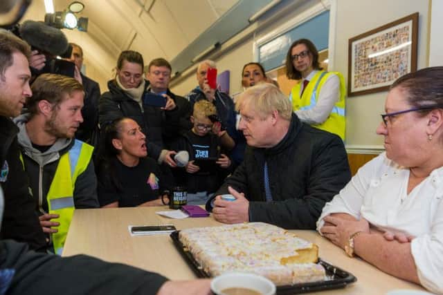 Prime Minister Boris Johnson meets residents in Stainforth. Pic: James Hardisty