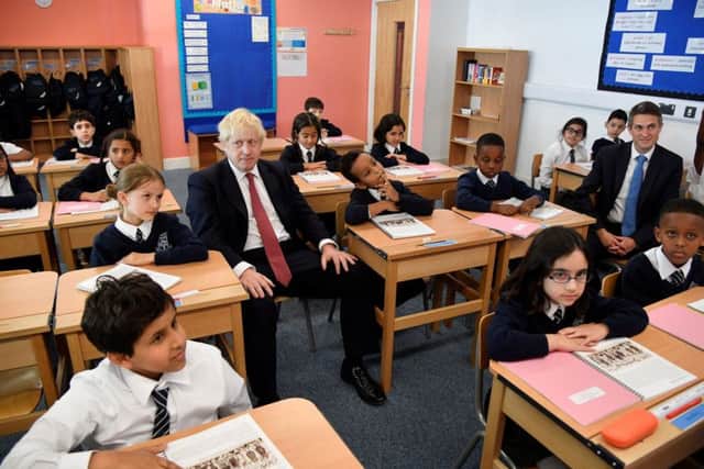 Boris Johnson and Gavin Williamson, the Scarborough-born Education Secretary, during a recent school visit.