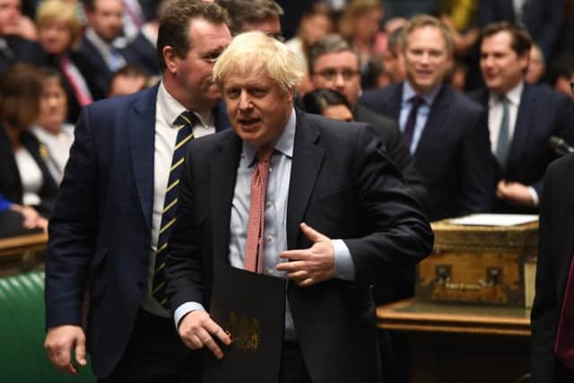 Boris Johnson enters the House of Commons after winning the general election.