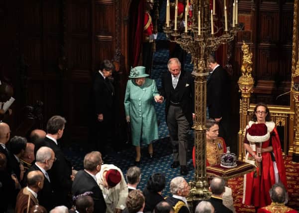 The Queen with the prince of Wales as she set out the Government's legislative programme.