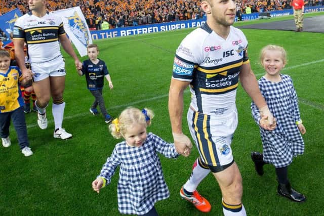 Rob Burrow, front, walks out at Old Trafford with two of his children ahead of Leeds Rhinos' 2017 Grand Final success against Castleford Tigers - the last game of his career. (SWPIX)