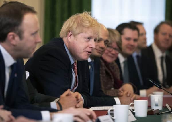 Boris Johnson addresses his first Cabinet meeting after the election.