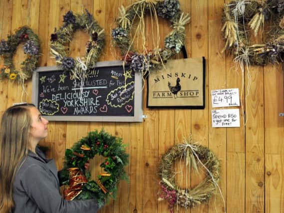 Wreaths, like these at Minskip Farm Shop, date back to the 17th century,