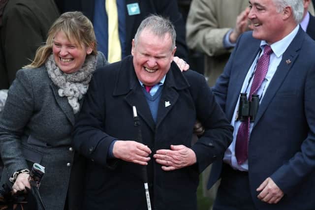 Owner Andrew Gemmell (centre) and his association with Paisley Park has been one of the racing stories of 2019. On the elft is trainer Emma Lavelle.