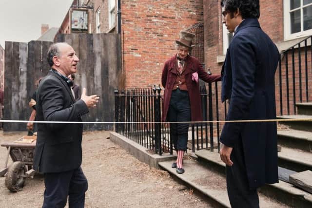 Armando Iannucci, Peter Capaldi and Dev Patel on set of The Personal History of David Copperfield in Hull. Picture submitted by Screen Yorkshire.