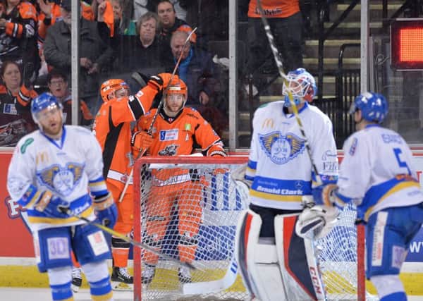 Robert Dowd celebrates his goal against Fife Flyers last weekend. Picture: Dean Woolley.