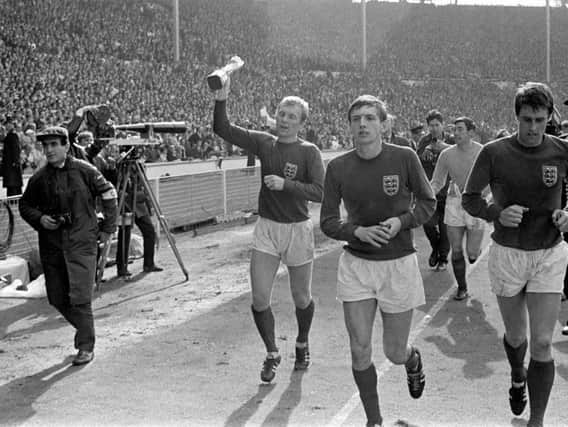 Martin Peters, centre, scored in the World Cup final in 1966