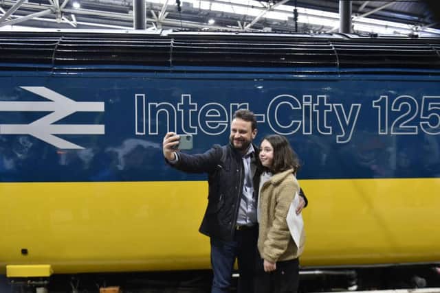 HST fans snap a selfie of the train