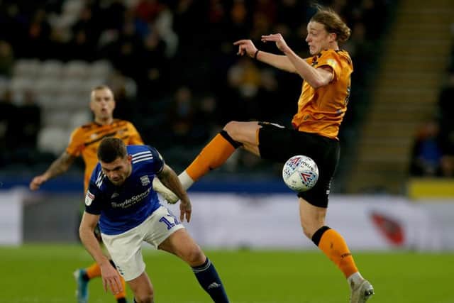 Hull City's Tom Eaves battles with Harlee Dean. Picture: Nigel Roddis/Getty Images
