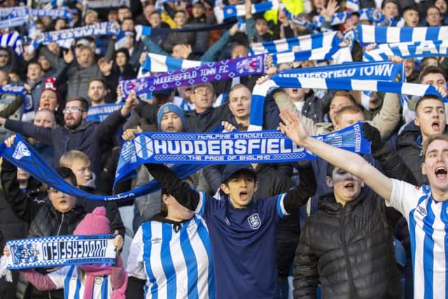 BIG HELP: Huddersfield Town's fans got behind their team during the 2-1 win over Nottingham Forest.  Picture: Bruce Rollinson